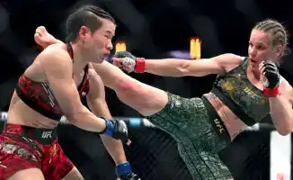 Валентина Шевченко побеждает Вэйли Чжан на UFC 322: символ силы и единства женщин в спорте