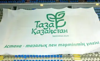 Юные футболисты из Астаны провели экоакцию на матче Казахстана и Коморских островов