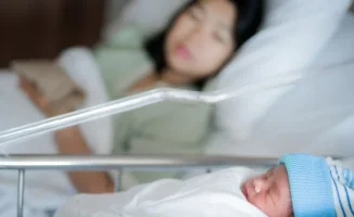 Потеря половины декретных: важность регулярности ежемесячного пособия по уходу за ребёнком в Казахстане