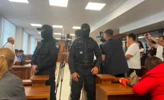 Судебный зал в Атырау: семья Жангелдина на скамье